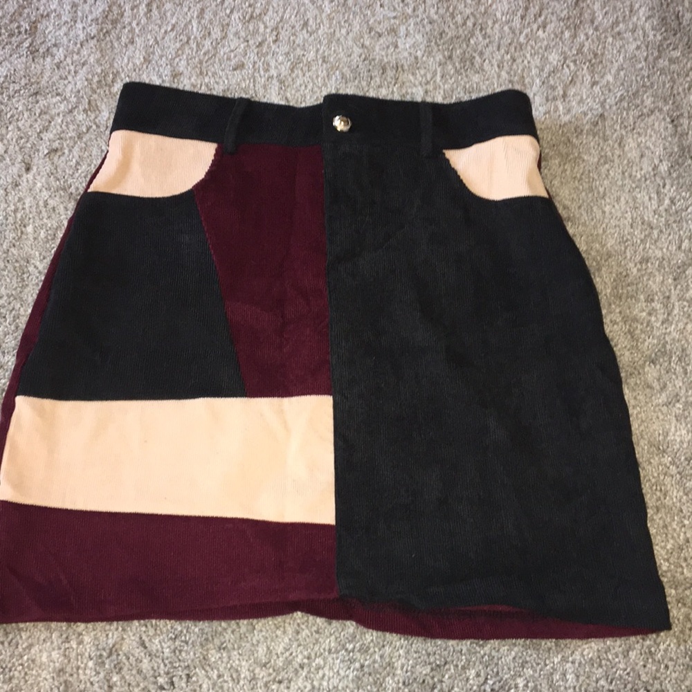 Creme, maroon, and black skirt